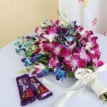 Purple And Blue Orchids With Cadbury Chocolates